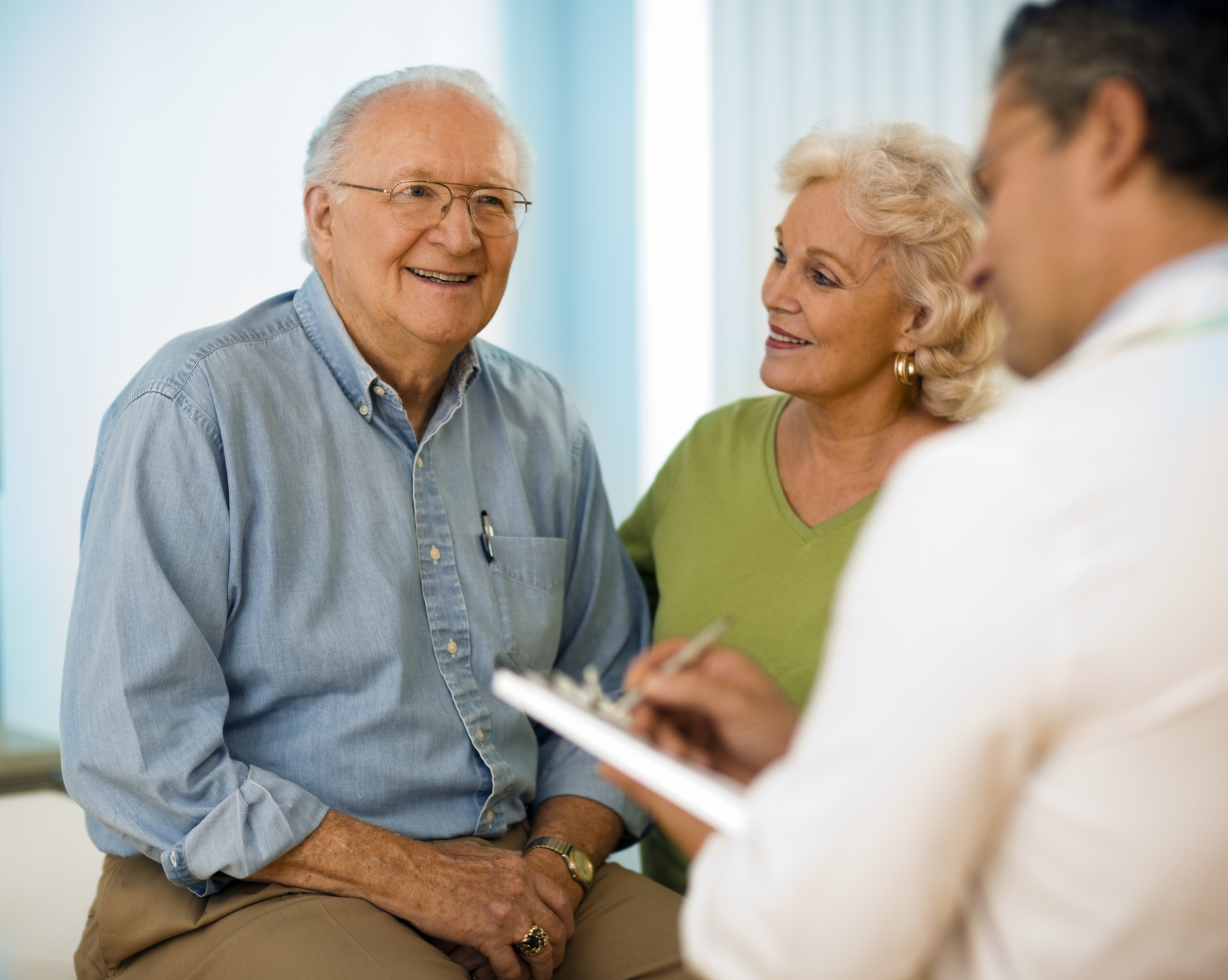 elderly man and wife visiting a psychiatrist